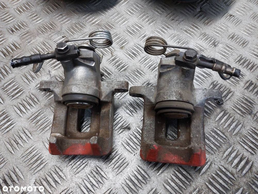 TARCZE HAMULCOWE TYŁ + ZACISKI VOLKSWAGEN PASSAT B5 - 3