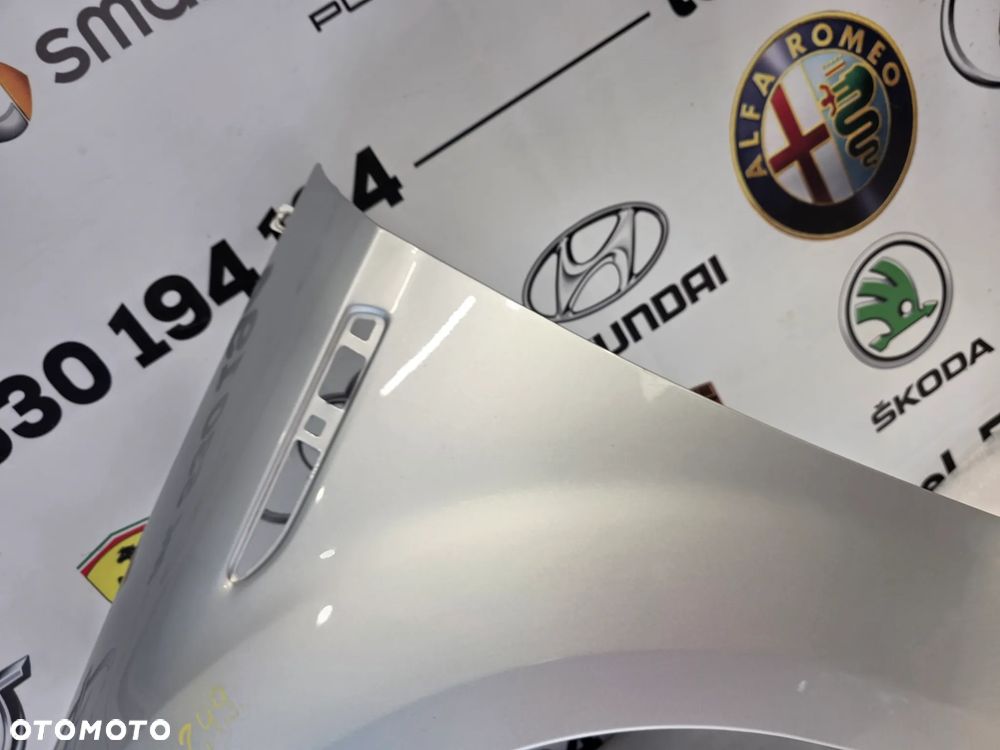 FORD MONDEO MK4 , LIFT 07-14 LEWY BŁOTNIK PRZEDNI PRZÓD NR AUKCJI BŁ249 - 6