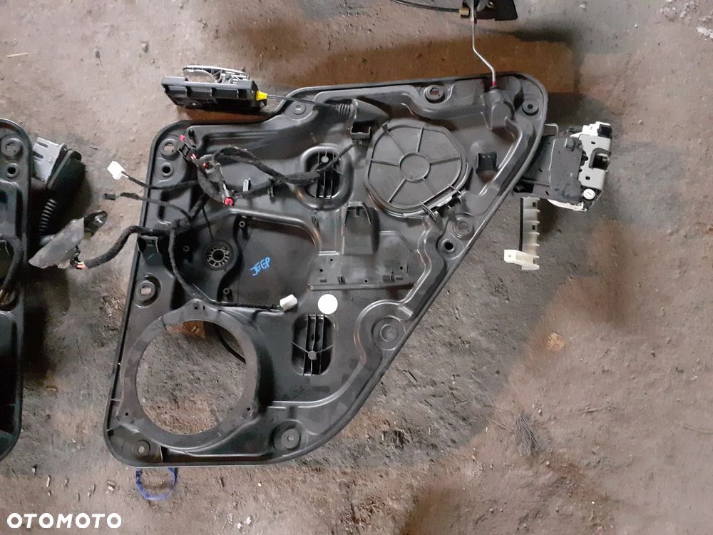 12175 Podnośnik szyby lewy prawy przód tył Jeep Grand Cherokee WK2 - 4