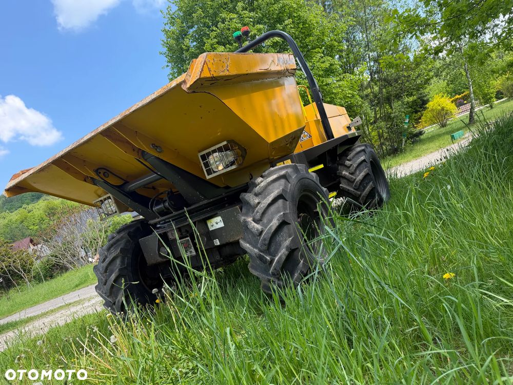 Terex Mecalac TA6s Wozidło wózek z Obrotową Kolebą. 6 ton ładowność. 4x4. Silnik Perkins. 4 cylindry. 808 mtg. 2022 rok. Kamera z wielkim Ekranem! Jazda Rewers 3prędkości. Maszyna jak Nowa z Norweskiego Gospodarstwa! Ani deka luzów i wycieków! Hydrostatic. Pełny Oryginał. Hamulce brzytwa. Serwisy w DEKRA. Maszyna Woziła lekkie ładunki. Praktycznie zerowe zużycie. Wielka Okazja. Wszystko w pełnym Oryginale. Opony Oryginał wszystkie jak Nowe. Komendy Głosowe w maszynie! - 5