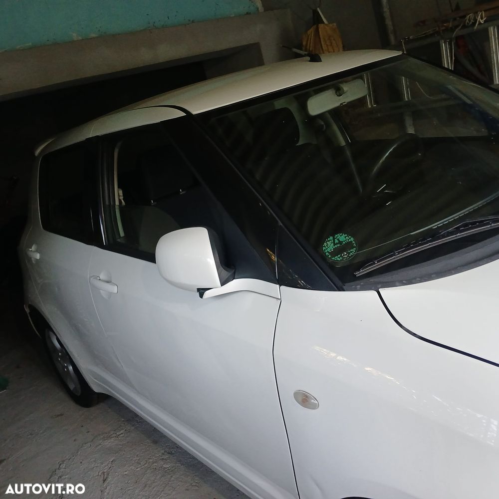 Suzuki Swift 1.3 Club - 7