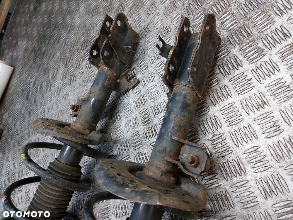 AMORTYZATOR LEWY + PRAWY PRZÓD X-TRAIL II T31 2.0 DCI - 2