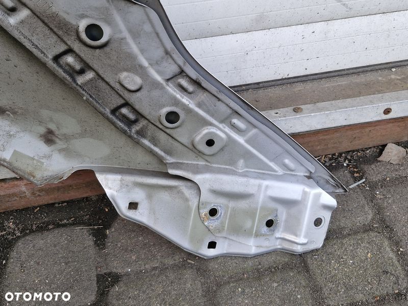 TOYOTA AVENSIS T27 LIFT T29 BŁOTNIK LEWY PRZÓD PRZEDNI 1F7 - 9