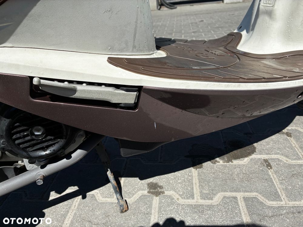 SYM MIO - 12