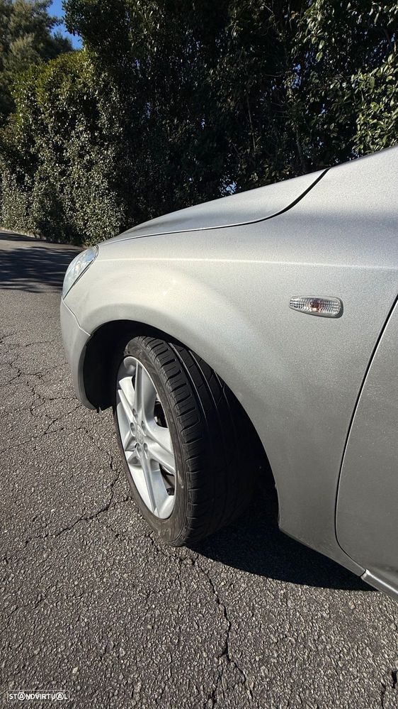 Kia Ceed 1.6 CRDi EX — fotografia 19