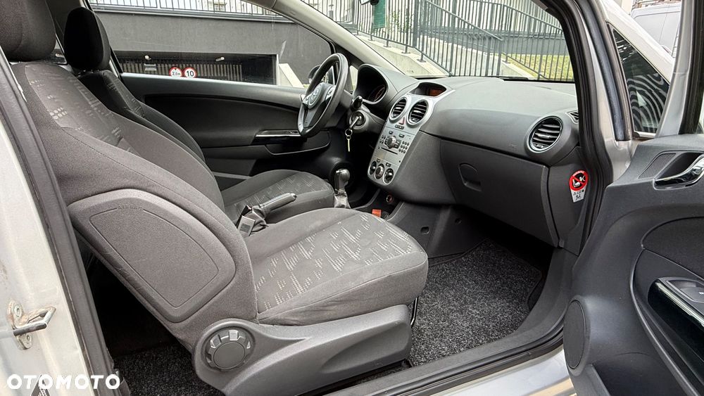 Opel Corsa 1.2 16V Enjoy - 23