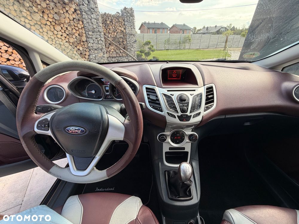 Ford Fiesta 1.4 Ghia - 19