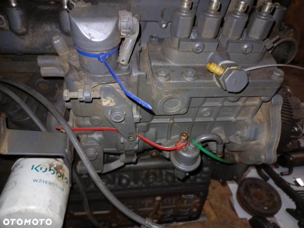 Silnik kubota V3800-DI-T-ET10, 7KBXL,BKBXL03,blok,głowica,turbo,wał,korbowód,tłok,koło rozrządu,zamachowe,wałek,1G5970461,TD04 HL,1G574,V33,V3600,V3800,D662,ISEKI,YANMAR,wtryski,pompa wtryskowa,kompletny silnik,obudowa,E4CG,C18W,V1505D. - 11