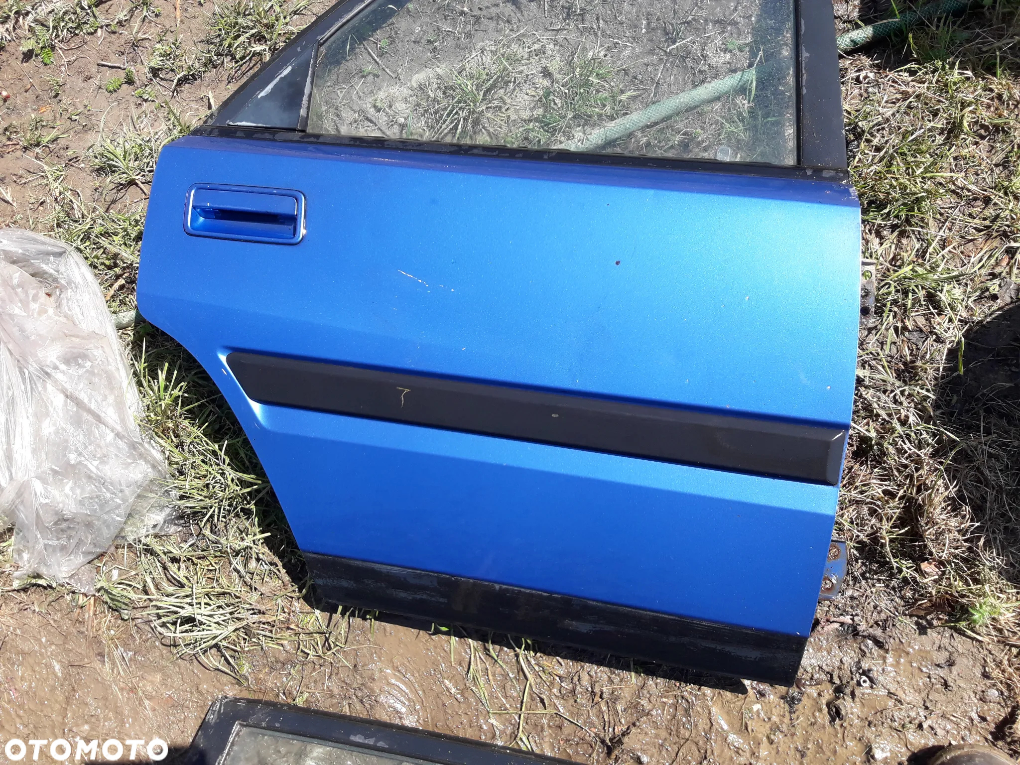Mazda 323f bg 89-94  Drzwi tylne prawe szyba tył - 2