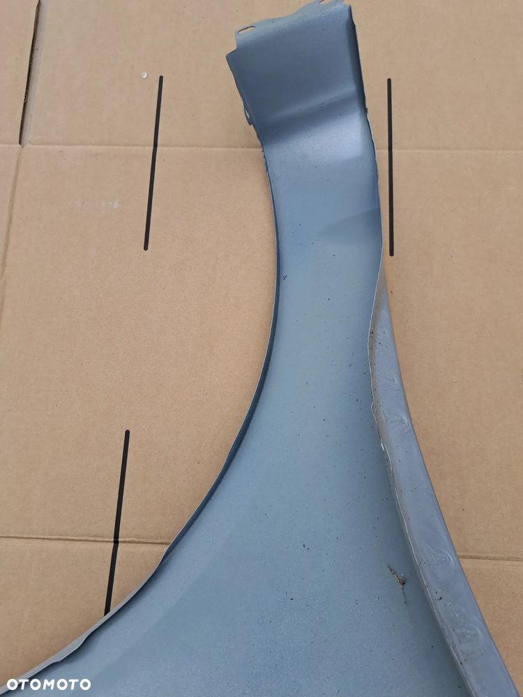 Błotnik przód lewy Opel Corsa D kod lakieru Z157 - 6
