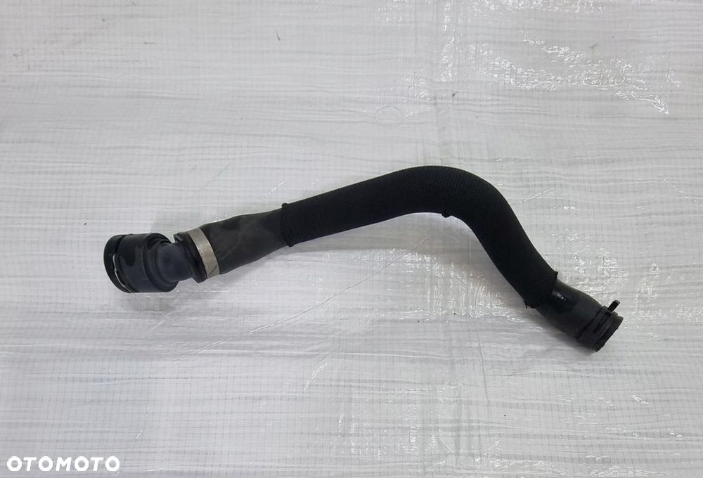 Opel Corsa E 1,4 Przewód wąż wody 39009665 - 2