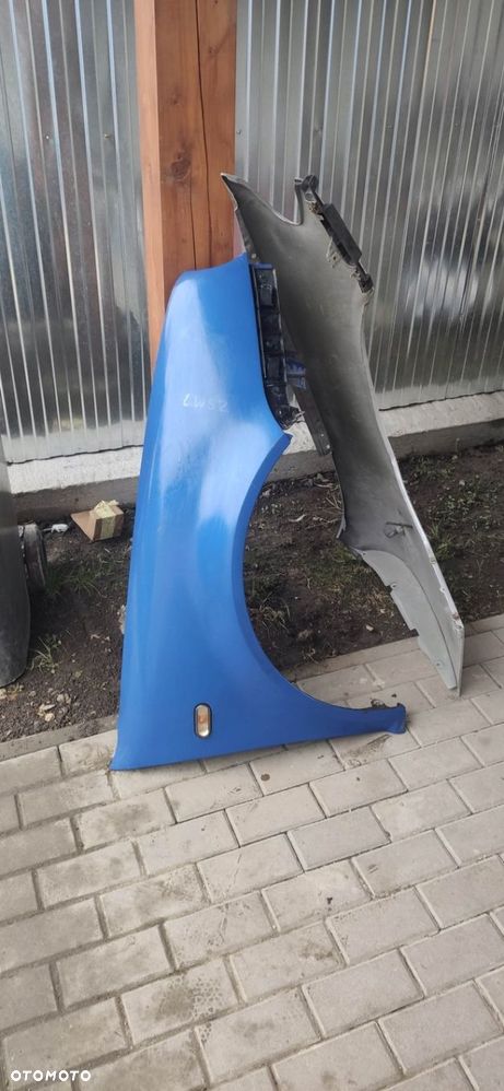 BŁOTNIK PRAWY PRZÓD VW GOLF IV LW52 - 1