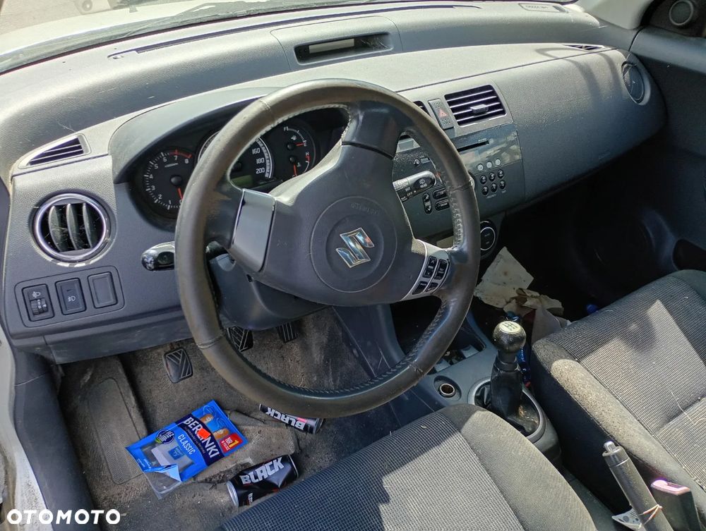 SUZUKI SWIFT 04-08 1.3 M13A - OSLONA  PRZECIWSLONECZNA LEWA PRAWA - 2