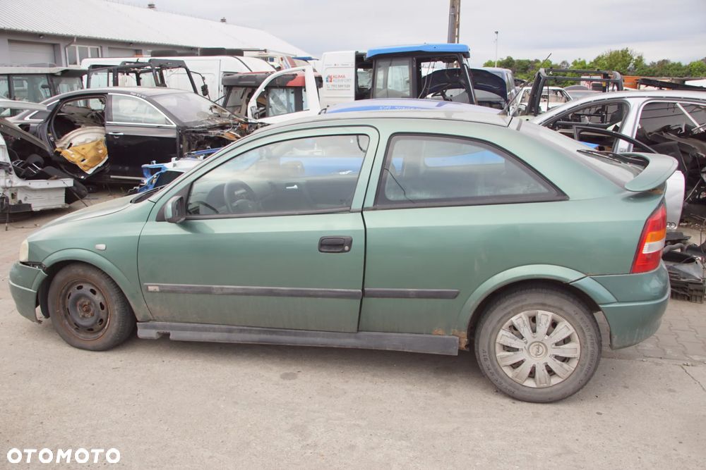 Auto na części - Opel Astra II G 1.6 16V 100 KM X16XEL F17 Z374 1998R Silnik Skrzynia Drzwi Maska Błotnik Zderzak Lampa Lusterko Klamka Szyba Deska Kokpit Sterownik Moduł Czujnik Licznik Panel Kierownica - 3