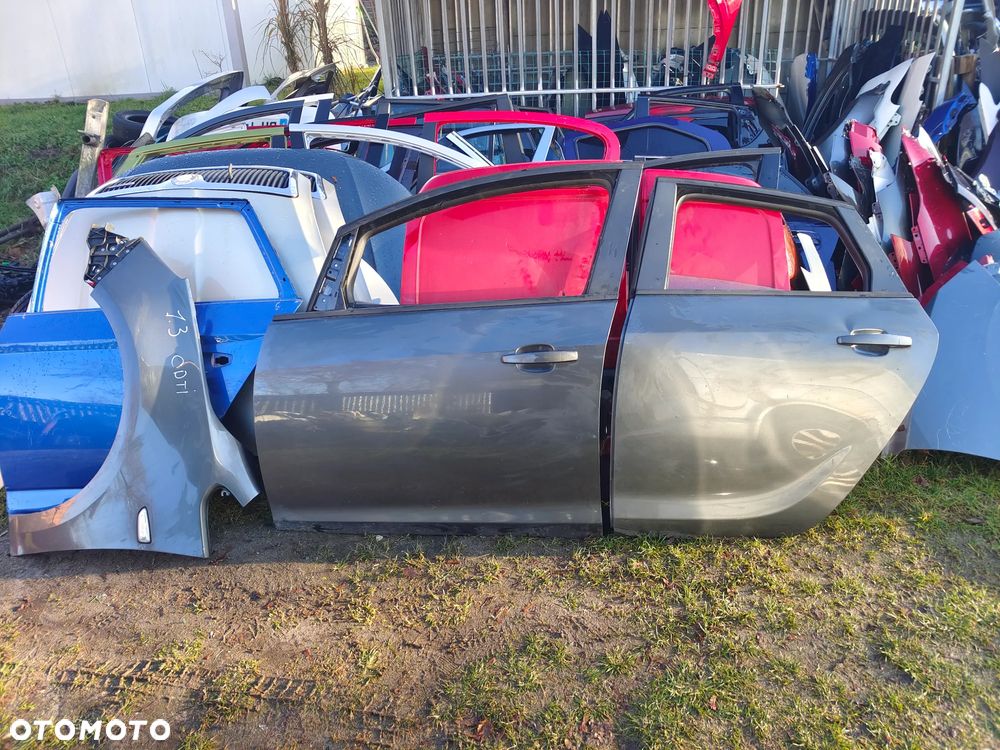 Opel Astra j błotnik przedni przód lewy GAL