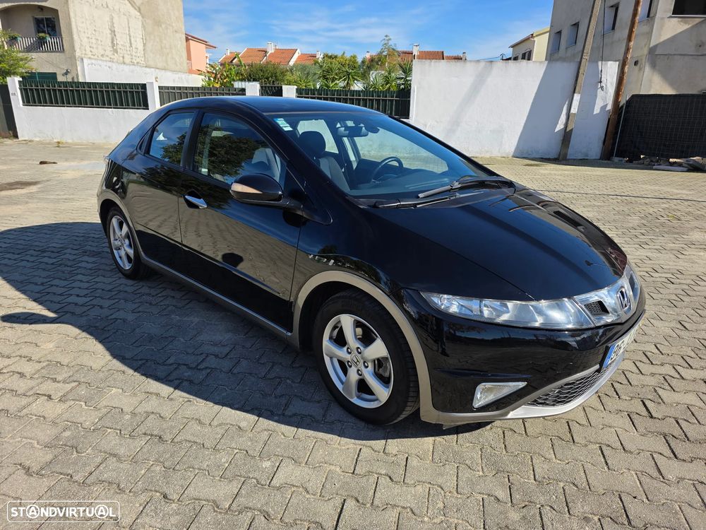 Honda Civic 1.4 i-VTEC Comfort - 1