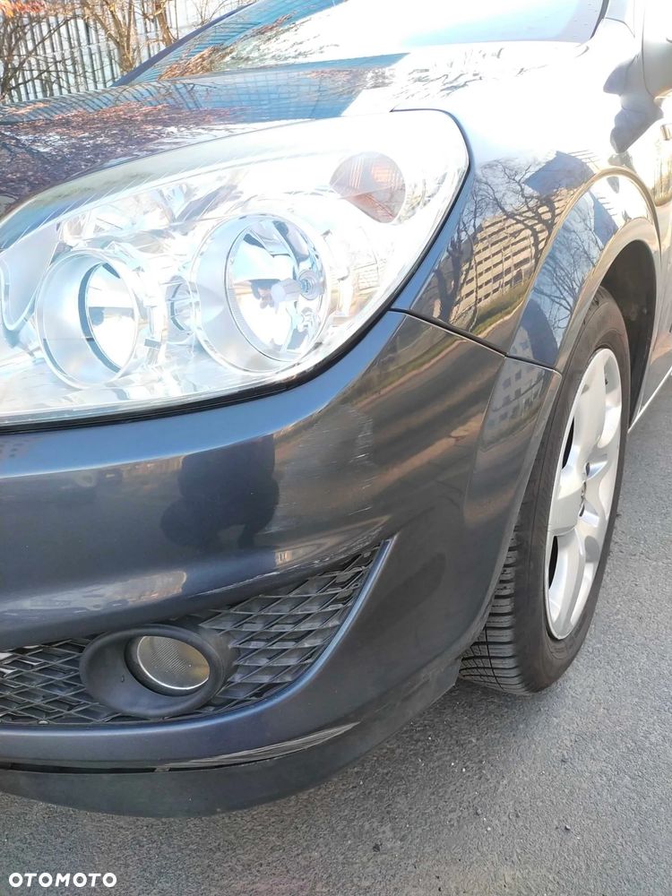 Opel Astra 1.4 - 13