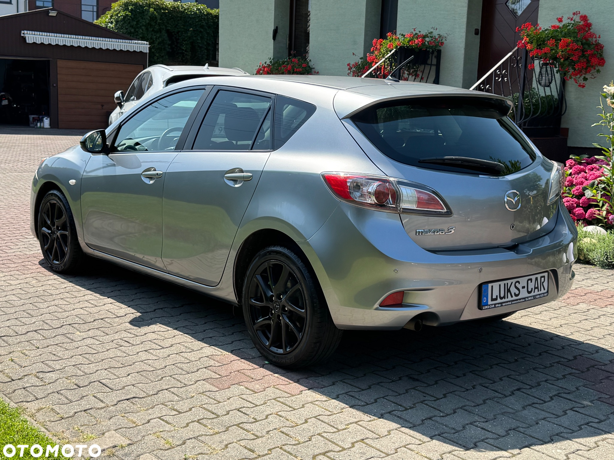 Mazda 3 1.6 Exclusive + - 5