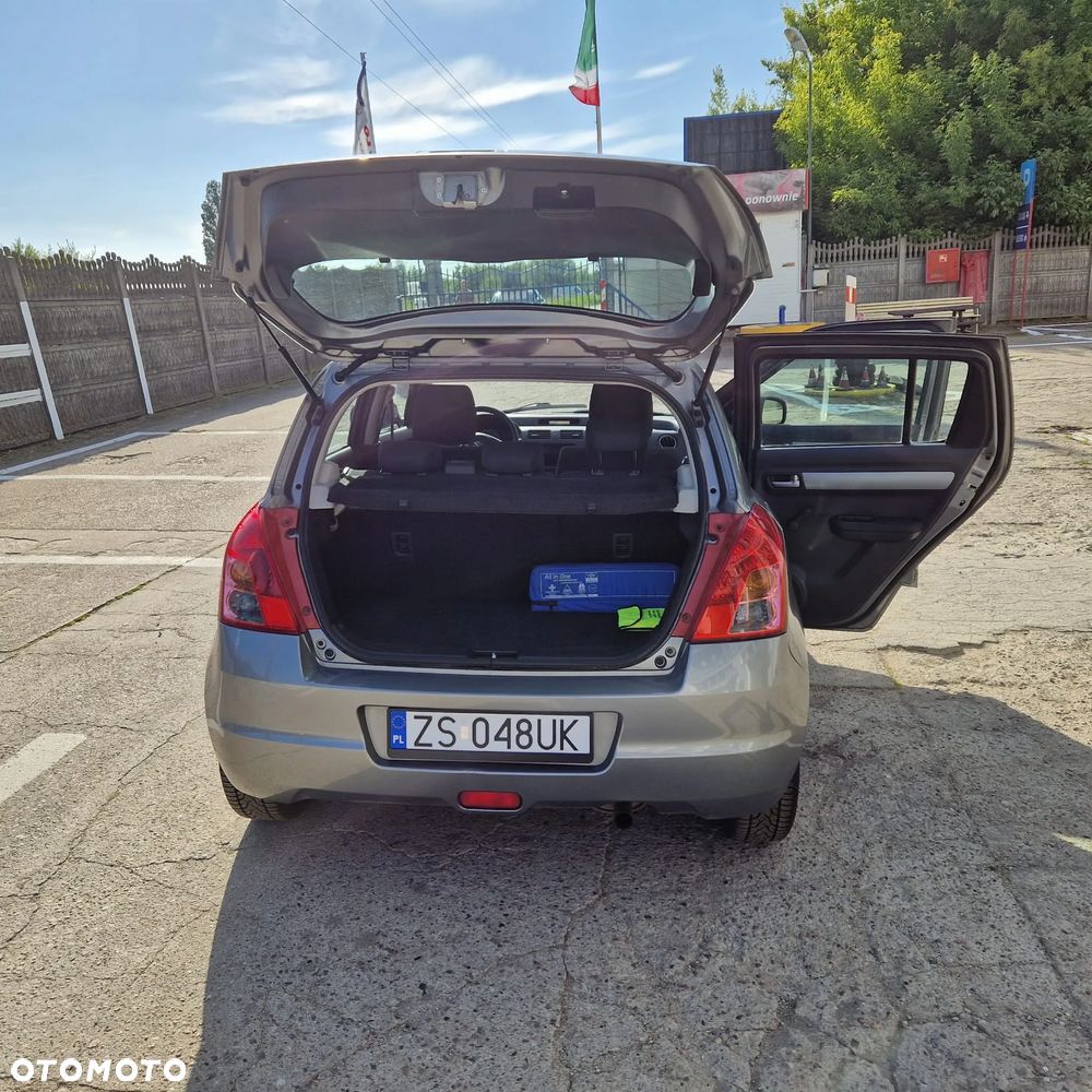 Suzuki Swift 1.3 Club - 8