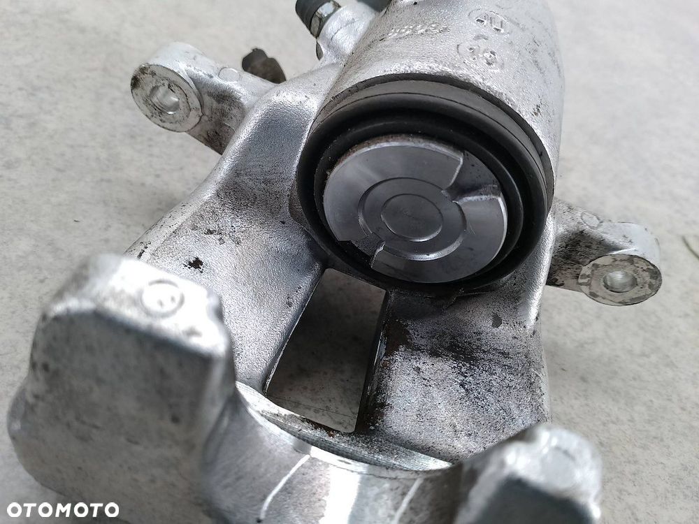 ZACISK HAMULCOWY LEWY TYŁ VW GOLF V TH793 CZH1266 ABE 1.4 TSI - 7