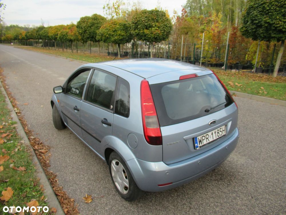 Ford Fiesta 1.4 Ghia - 13