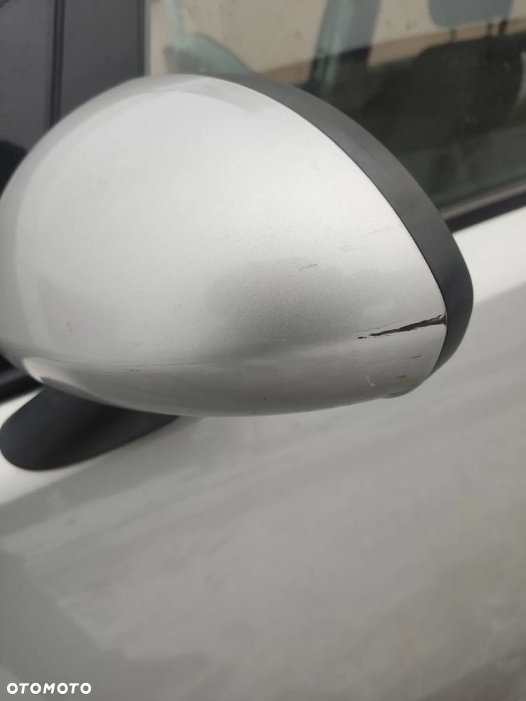 Opel Corsa 1.2 16V Cosmo - 12