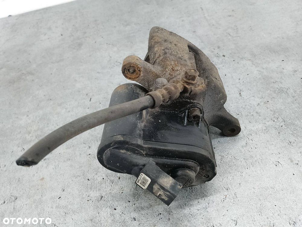 ZACISK HAMULCOWY LEWY TYŁ VW PASSAT CC 2.0 TDI - 2