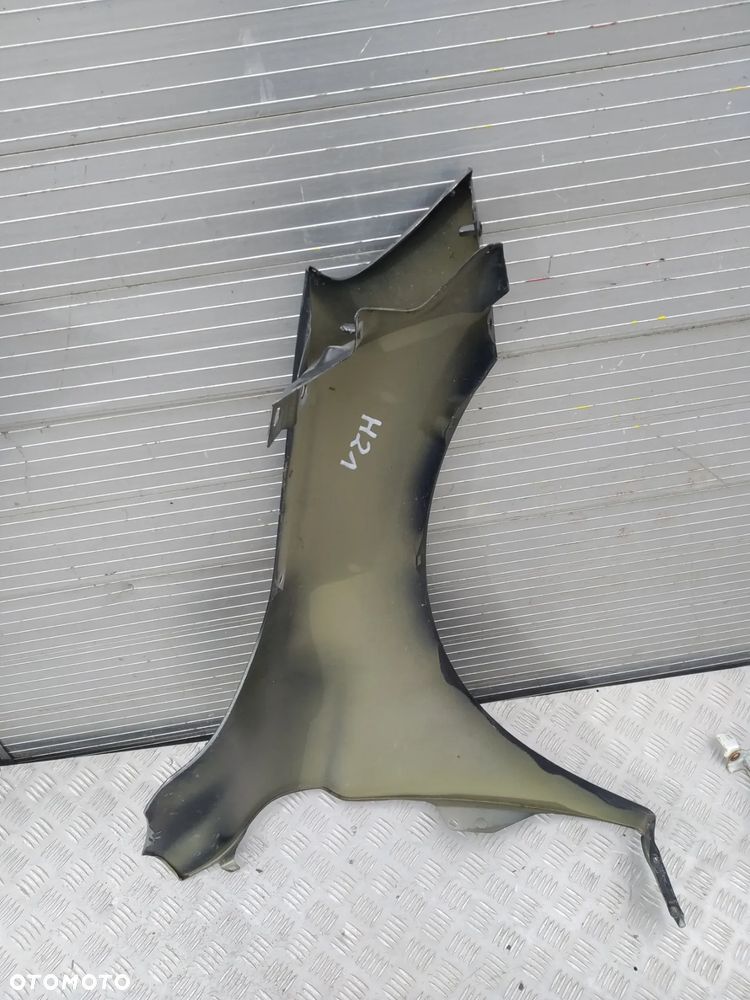 F624/H21 LEWY BŁOTNIK VOLVO XC60 2008-17 - 2