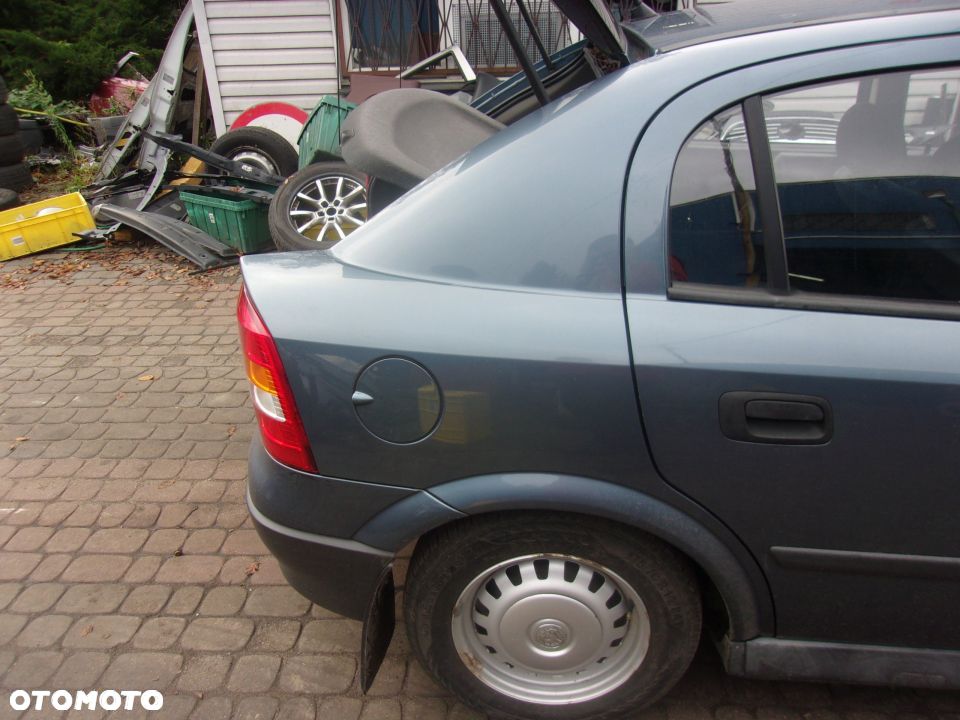 BŁOTNIK TYLNY LEWY LUB PRAWY OPEL ASTRA II G 5D - 3