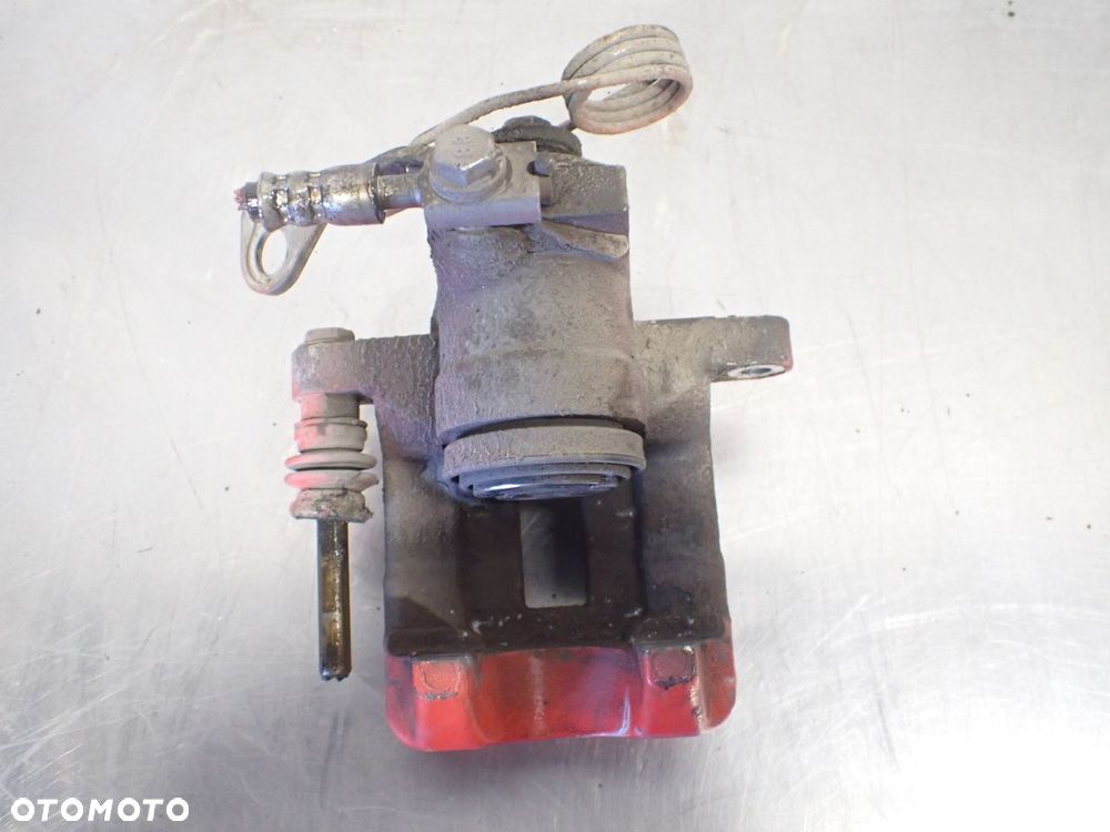 ZACISK HAMULCA PRAWY TYŁ AUDI A6 C5 2.4 - 4