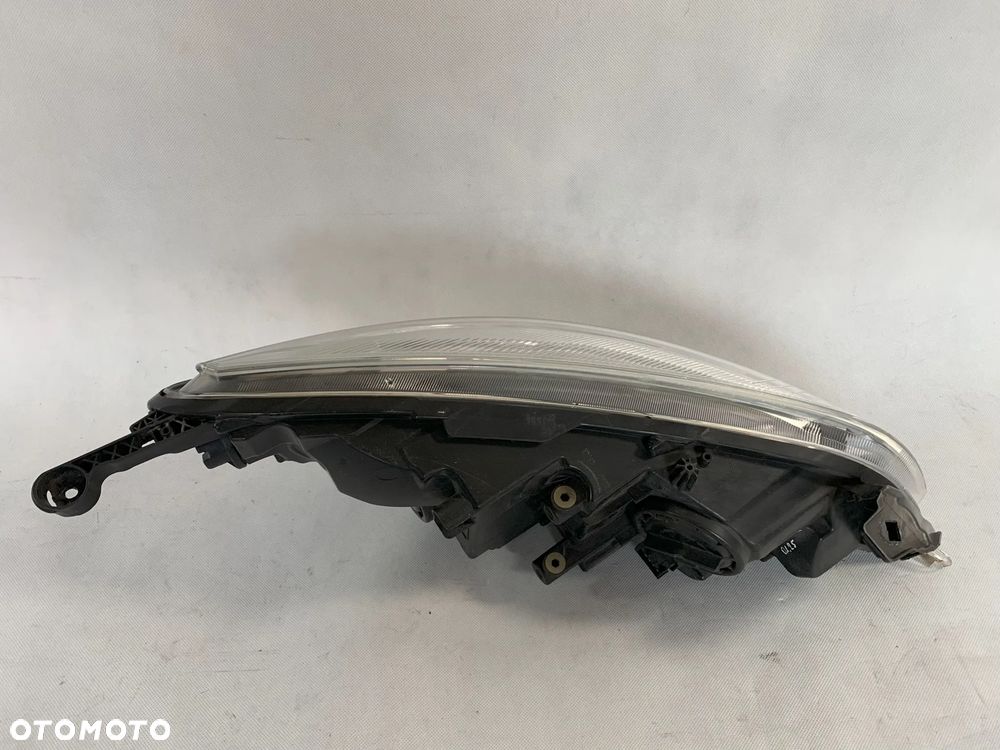 Opel Astra 4 IV J 10r Reflektor lewy lampa lewa 2010 - 2