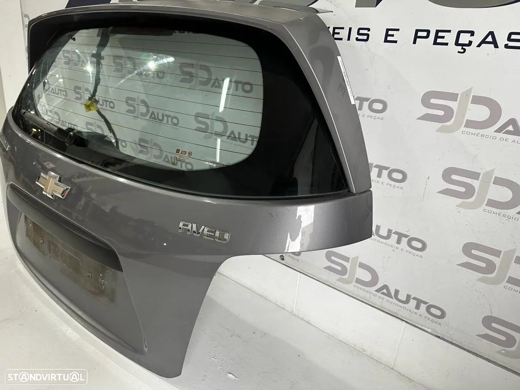 Tampa Mala - Chevrolet Aveo T300 - 2