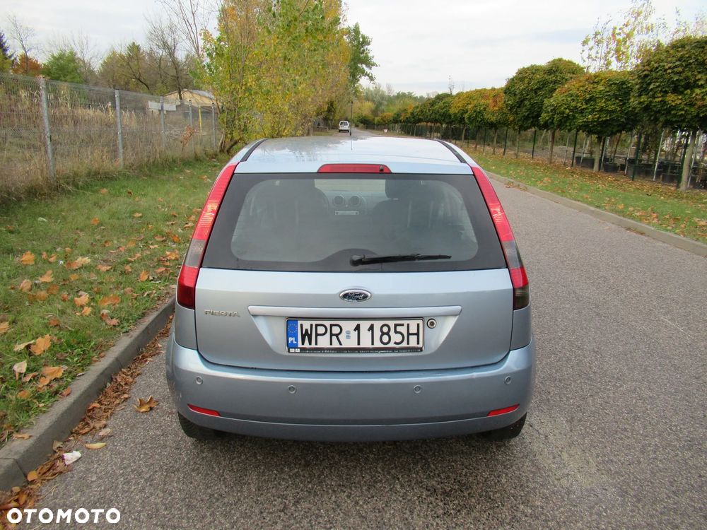 Ford Fiesta 1.4 Ghia - 10