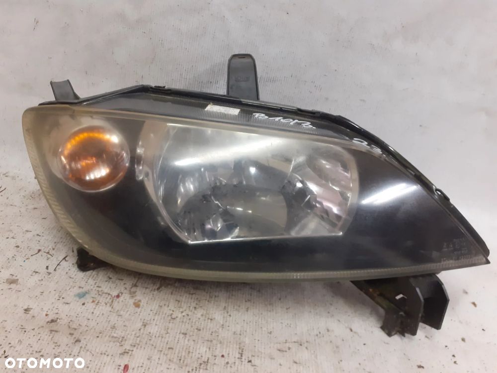 .  PRZOD PRZEDNIA LAMPA PRAWA MAZDA 2 DY - 1