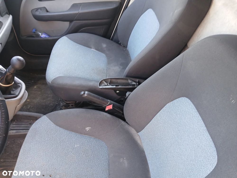 FIAT DOBLO II 2   fotel fotele kanapa deska kokpit podsufitka boczek boczki klamka podłokietnik licznik - 6