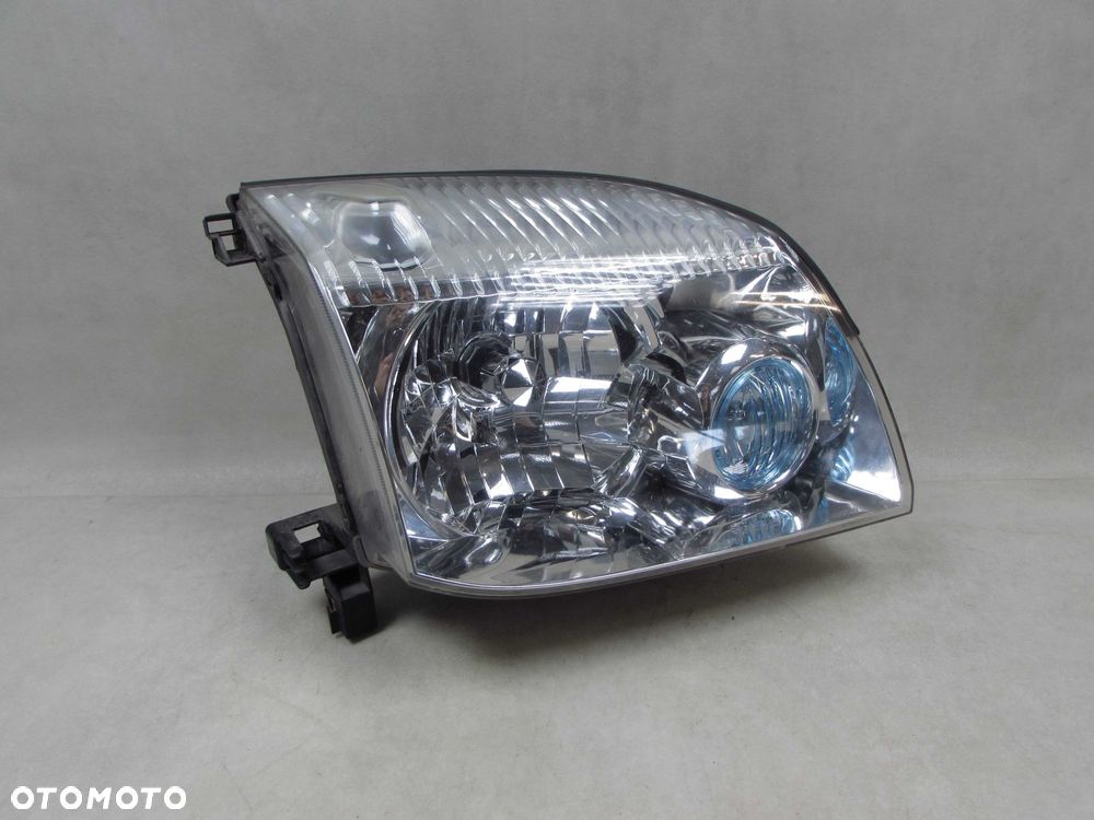 NISSAN X-TRAIL T30 LIFT 04-07 LAMPA PRZOD PRAWA REFLEKTOR XENON UK - 1