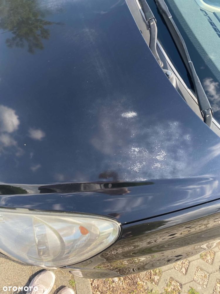 Opel Corsa 1.2 16V Cosmo - 10