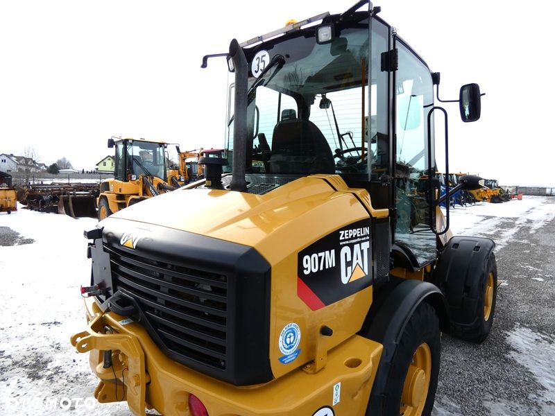 Caterpillar CAT 907M Z Niemiec / Wyjątkowo Wyposażony / 35km/h / 3.050mtg / - 34