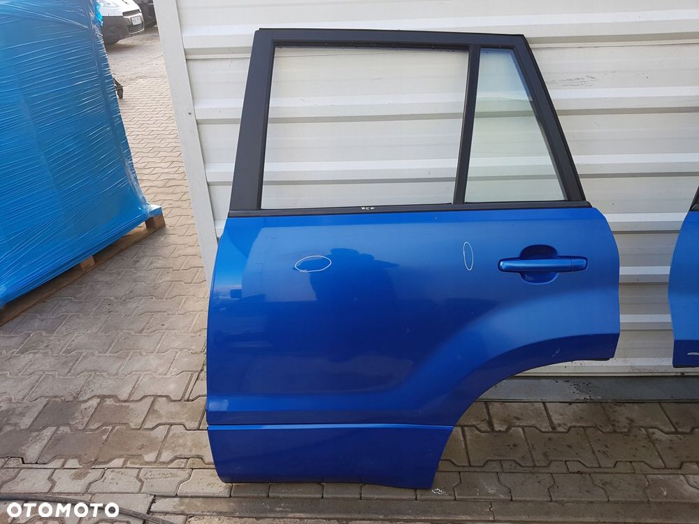 SUZUKI GRAND VITARA 2 II 05-10 DRZWI LEWE TYŁ ZCW - 1