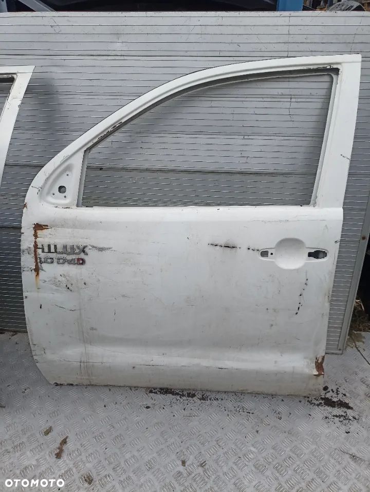 115. TOYOTA HILUX DRZWI LEWE 2005- 4-DRZWIOWY - 1