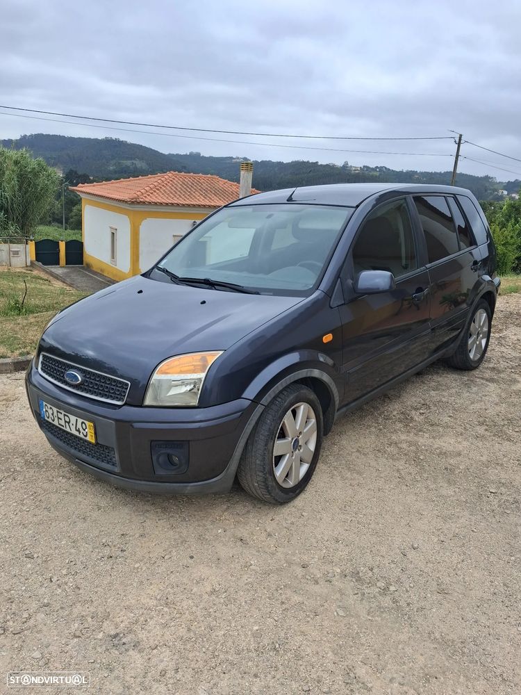 Ford Fusion 1.4 TDCI + - 13