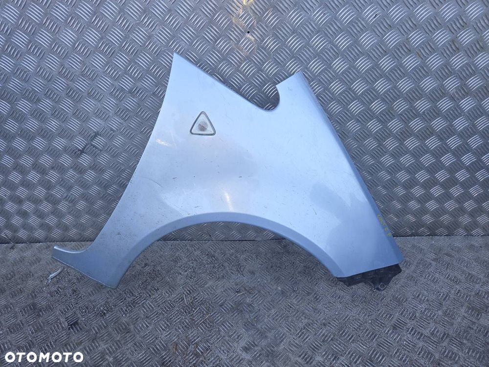 BŁOTNIK PRAWY PRZEDNI MITSUBISHI COLT - 1