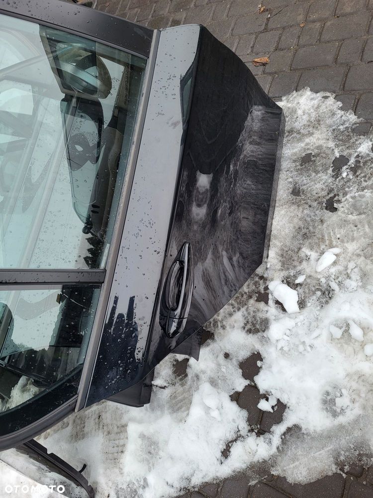 Drzwi tylne prawe bmw e87 2009r lakier Schwarz 2 kompletne bez korozji