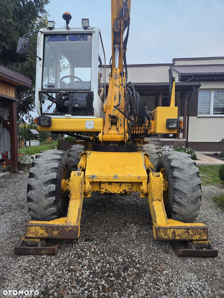 Mecalac 11CX i - 11