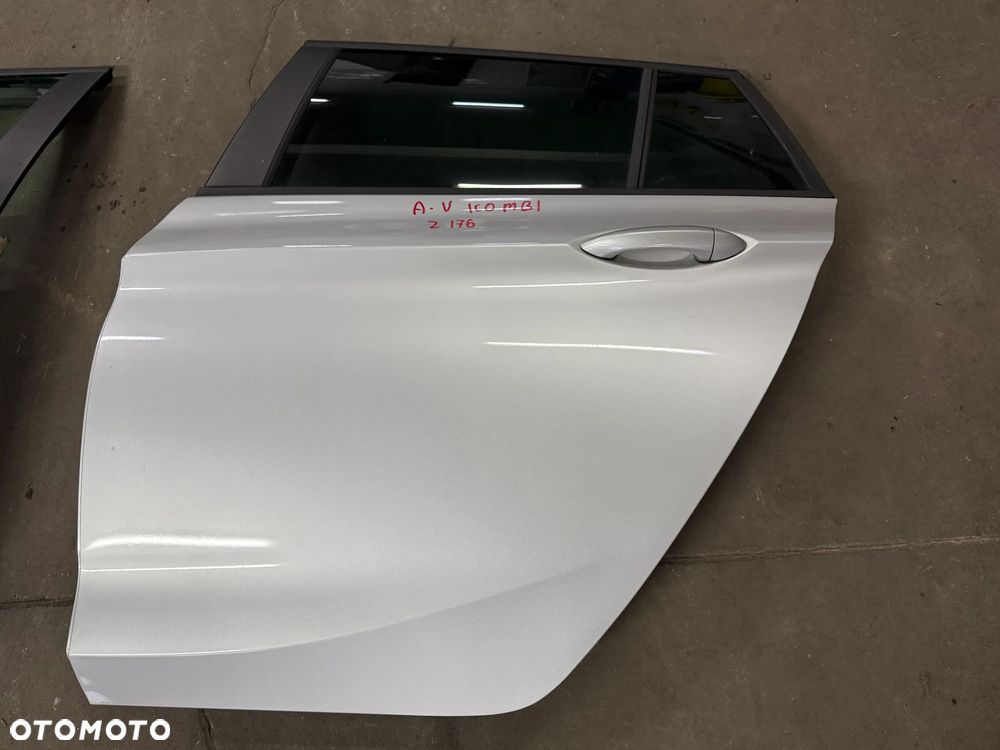 OPEL ASTRA V Z176 KOMBI DRZWI TYLNE LEWE