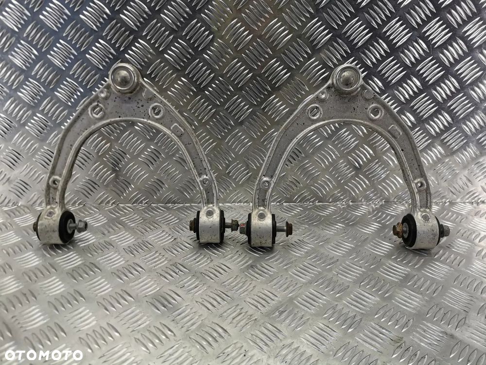 VW TOUAREG 7P 10-18R WAHACZE GORNE ORYGINALNE CENA ZA KOMPLET