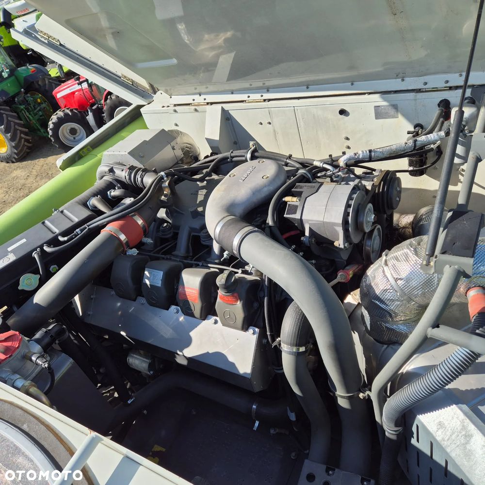 Claas Lexion 770TT z hederem - 28