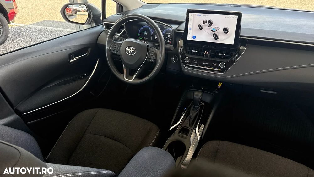 Toyota Corolla 1.8 HSD Business - 19