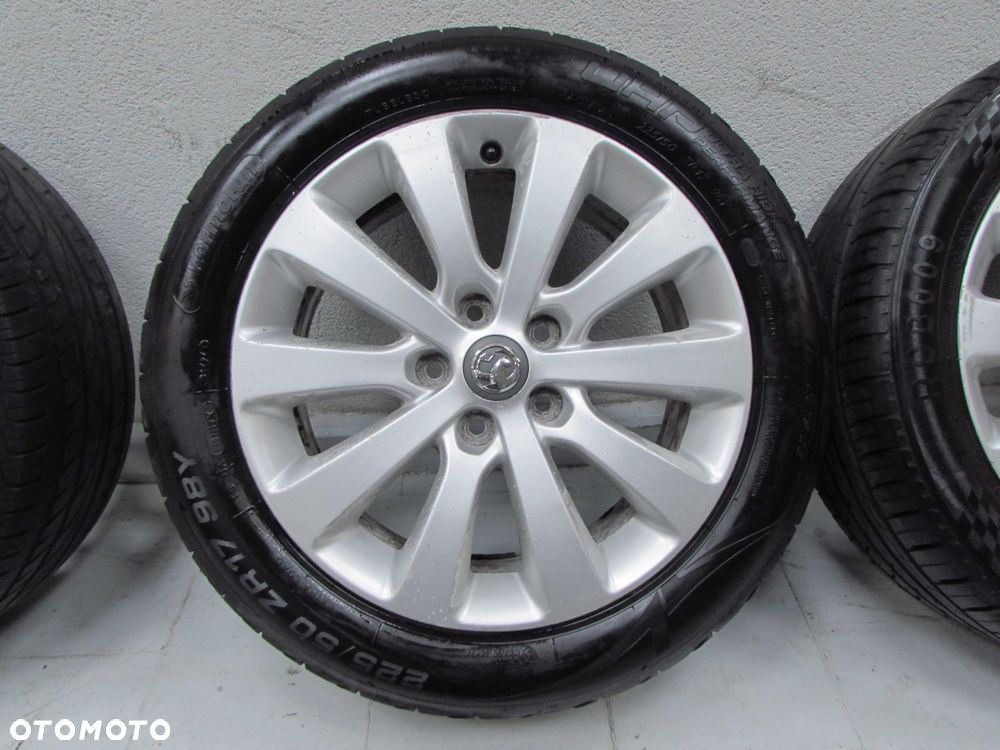 OPEL ASTRA IV J ZAFIRA C KOLA FELGI ALUMINIOWE 13276347 5X115 7J17 ET44 225/50R17 - 13