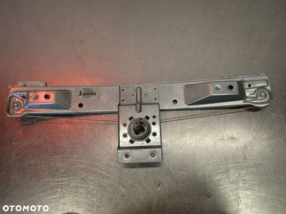 PODNOŚNIK SZYB LEWY TYŁ OPEL CORSA D 1.4 - 1